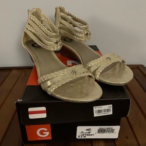 By Guess, gold, wedged sandal